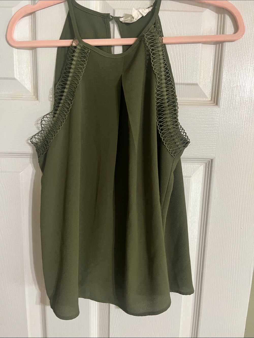 Dark green tank top by Sweet Wanderer.